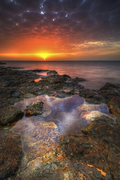 Artem Nosenko: sunset water rocks 