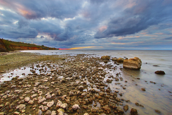 Artem Nosenko: clouds shore hill rocks water 