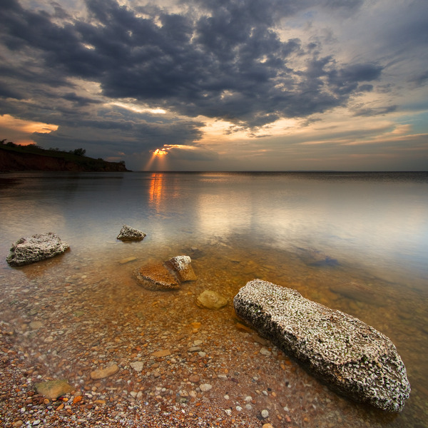 Artem Nosenko: stones water sun clouds